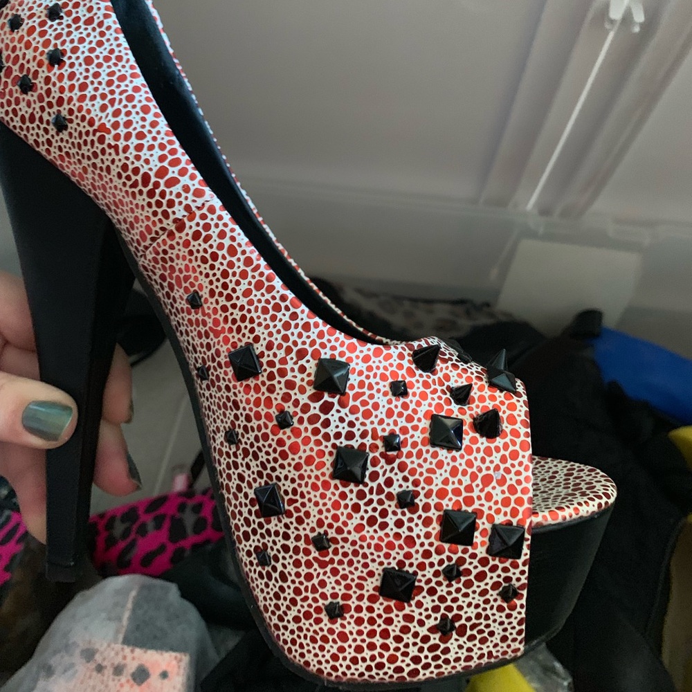 Never worn spike heels in bags
